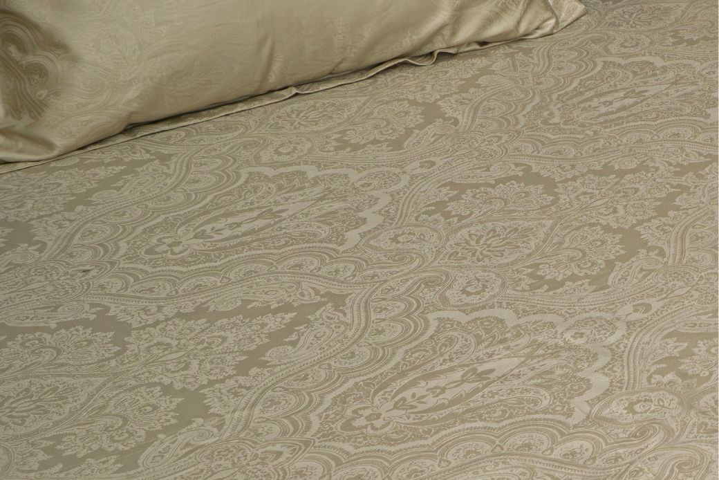 A neatly styled modern bedroom featuring premium beige 400 TC cotton bedsheets and matching pillows, showcasing a luxury hotel quality bedding finish.